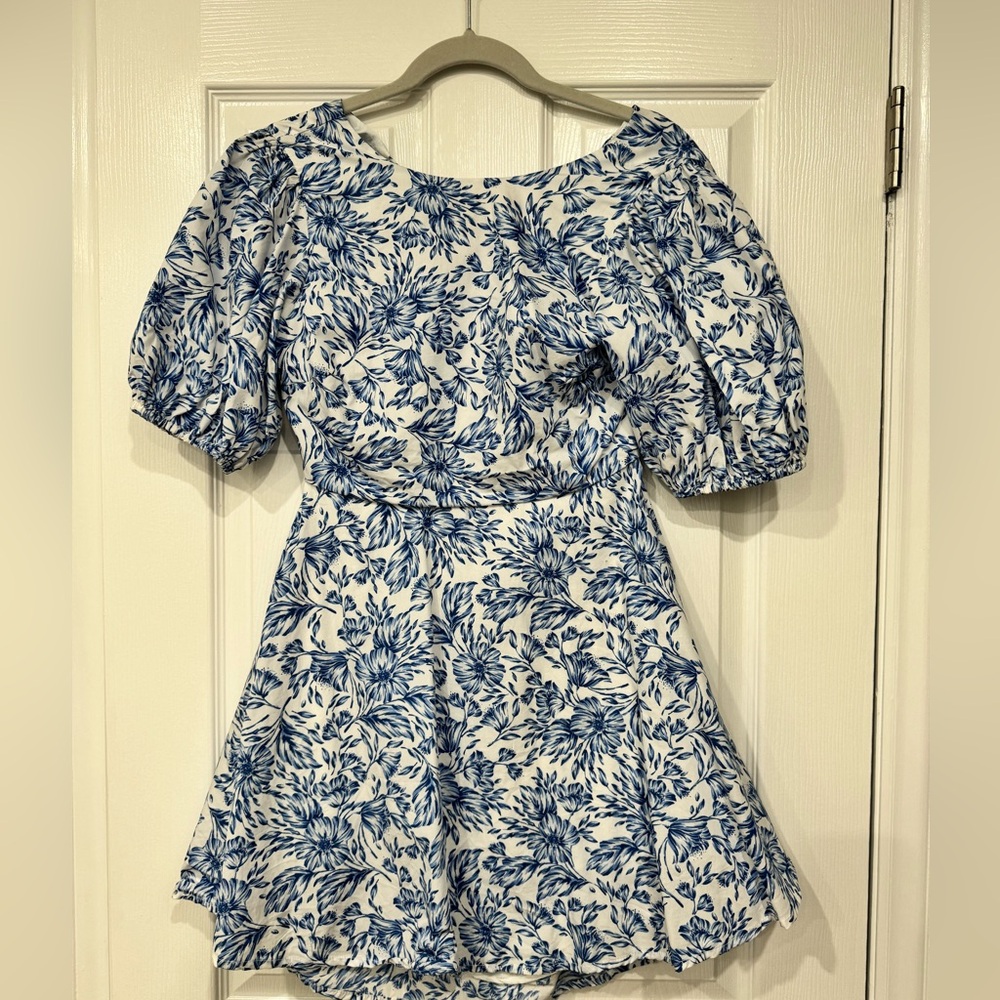 Olivaceous blue and white floral dress with open back. Size small